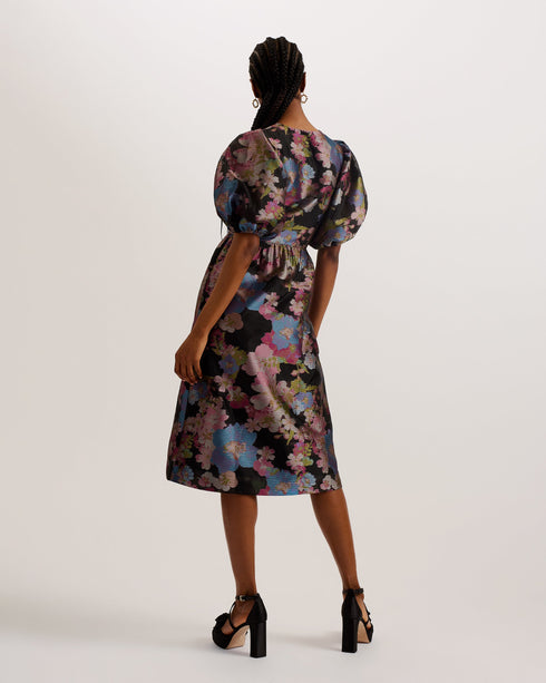 MATSEA-Dresses-MATSEA isn't just a dress, it's a statement. This midi length number comes in a fancy floral jacquard design, crowned with balloon short sleeves for a dose of drama. The low V neckline gives way to button down fastenings that add a sweet finish to this piece. Midi dress Floral jacquard design Button down fastening Balloon short sleeves Low V neckline Fitted waist with pleats Lydia is 5'10" / 1.77m and wears a Ted size 1- Ted Baker Romania